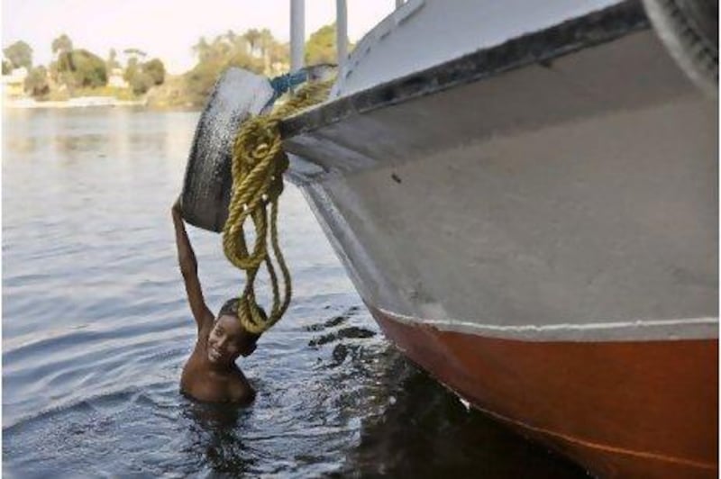 A boy swims in the Nile near Aswan.