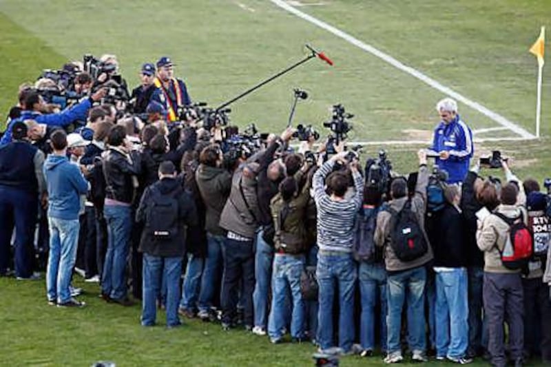 Raymond Domenech, the France coach, speaks in front of journalists at the Fields of Dreams stadium in Knysna yesterday.