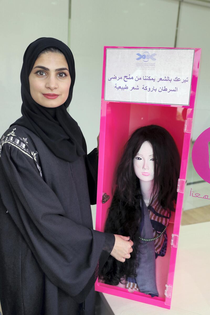 Sharjah, United Arab Emirates - August 16, 2018: Amal Al Mazmi, head of Friends of Cancer Patients talks about a change in hair donation culture among Emiratis and Arabs with an increase in numbers of those who donate their hair in favour of cancer patients. Thursday, August 16th, 2018 in Sharjah. Chris Whiteoak / The National