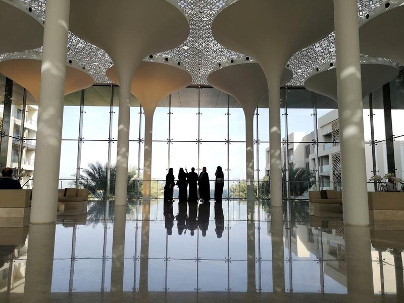 Omani women enjoy the sea view from a hotel lobby in the newly developed property, Al Mouj Muscat, in Muscat, Oman. Reuters