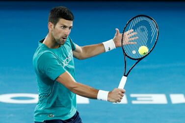 Novak Djokovic of Serbia practices on Rod Laver Arena ahead of the Australian Open final at Melbourne Park on Sunday. Getty