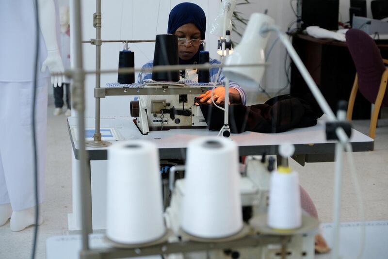 A woman works in a sewing workshop supervised by a charity in Benghazi, Libya. Reuters