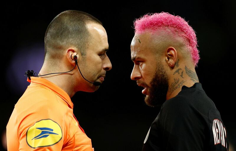 Neymar remonstrates with referee Jerome Brisard. Reuters