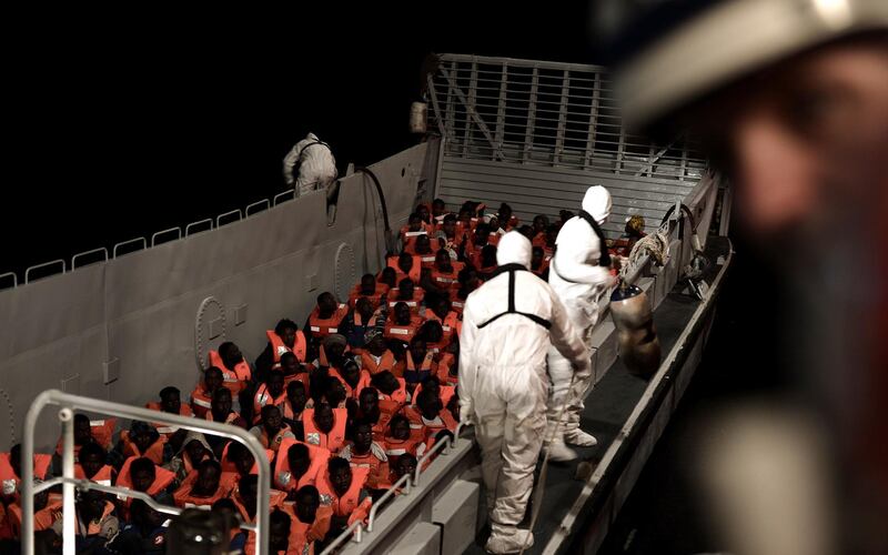 Migrants are rescued by staff members of the MV Aquarius, a search and rescue ship run in partnership between SOS Mediterranee and Medecins Sans Frontieres in the central Mediterranean Sea, June 10, 2018. Picture taken June 10, 2018. Karpov/handout via REUTERS ATTENTION EDITORS - THIS IMAGE WAS PROVIDED BY A THIRD PARTY. NO RESALES. NO ARCHIVES.