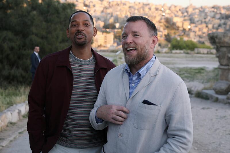 Will Smith and director Guy Ritchie speak to the media during their visit at the Amman Citadel, an ancient Roman landmark, on May 13. Reuters