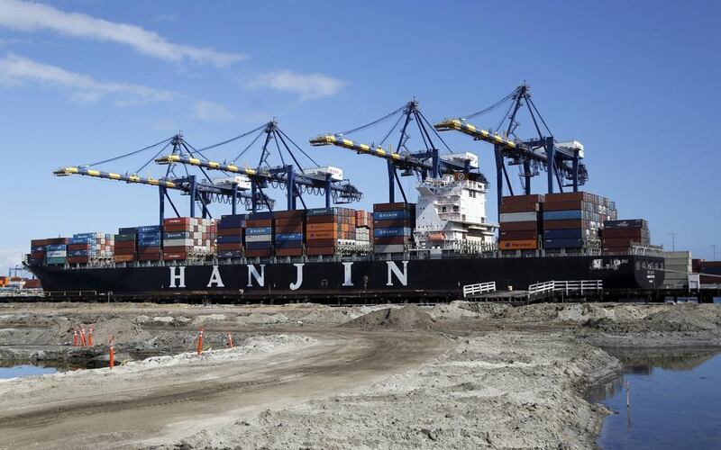 The container ship Hanjin Boston unloads at the Port of Los Angeles in California on Tuesday. Reed Saxon / AP Photo