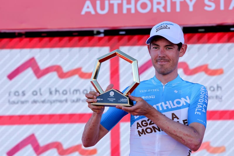 Ben O'Connor on the podium after winning Stage 3 of the UAE Tour from Al Marjan Island to Jebel Jais. AFP
