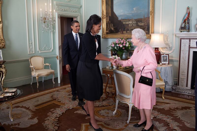Mr Obama and former first lady Michelle Obama are welcomed by the queen to Buckingham Palace on April 1, 2009.  Photo: White House 