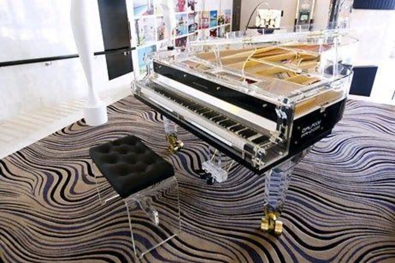 The lobby of Sofitel Abu Dhabi features a transparent piano. Sarah Dea / The National