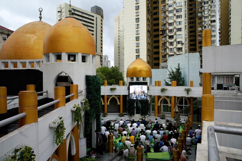 Muslims offer Eid Al Adha prayers at a mosque in Shanghai, China.  Reuters