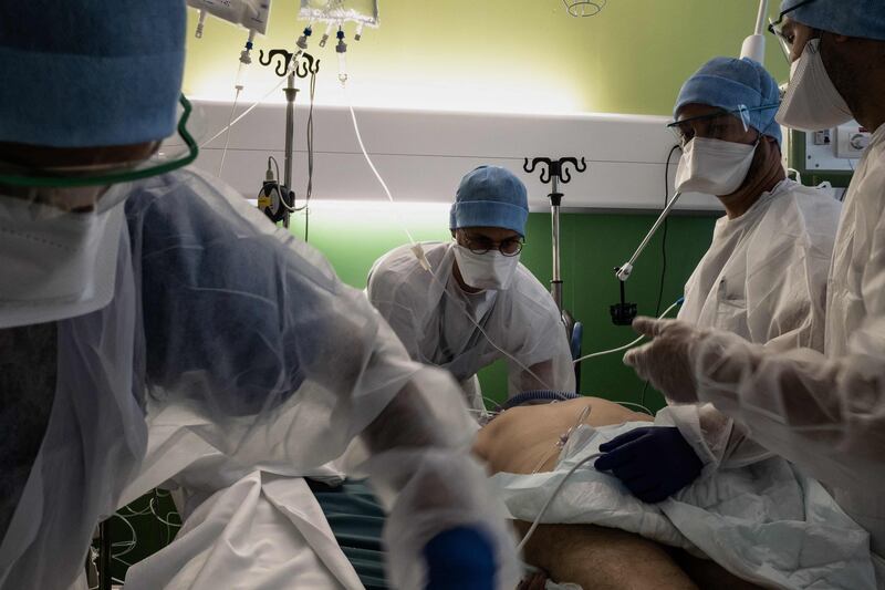Nurses and doctors take care of a patient infected with Covid-19 in the intensive care unit of Lyon-Sud hospital in Pierre-Benite, on September 8. AFP