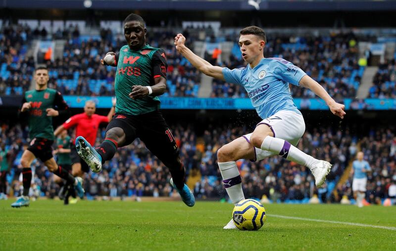 Soccer Football - Premier League - Manchester City v Aston Villa - Etihad Stadium, Manchester, Britain - October 26, 2019  Manchester City's Phil Foden in action with Aston Villa's Marvelous Nakamba  REUTERS/Phil Noble  EDITORIAL USE ONLY. No use with unauthorized audio, video, data, fixture lists, club/league logos or "live" services. Online in-match use limited to 75 images, no video emulation. No use in betting, games or single club/league/player publications.  Please contact your account representative for further details.