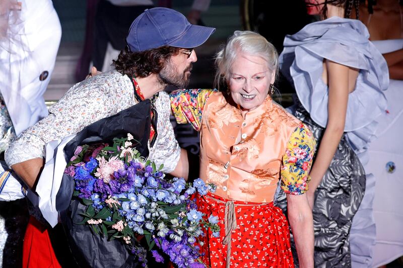 British designer Vivienne Westwood appears with her husband Andreas Kronthaler at the end of her Spring/Summer 2018 women's ready-to-wear collection show during Fashion Week in Paris, France September 30, 2017. REUTERS/Charles Platiau