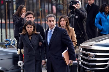 Michael Cohen, second from right, President Donald Trump's former lawyer, is accompanied by his children and his wife Laura Shusterman to court for his sentencing for dodging taxes, lying to Congress and violating campaign finance laws. AP Photo