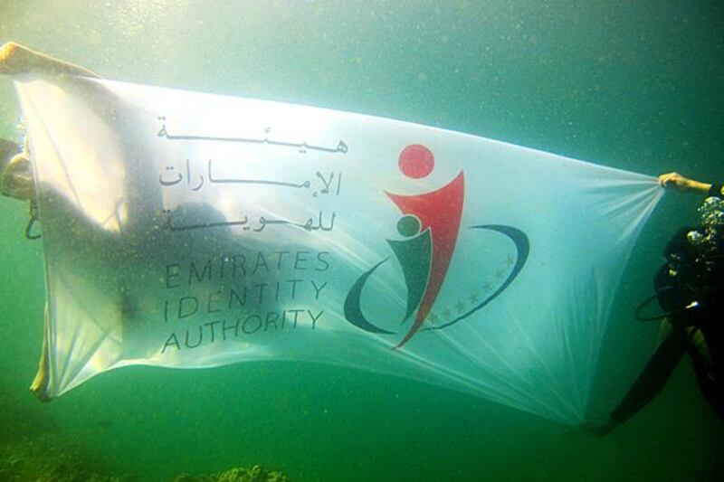 The Emirates Identity Authority banner underwater.