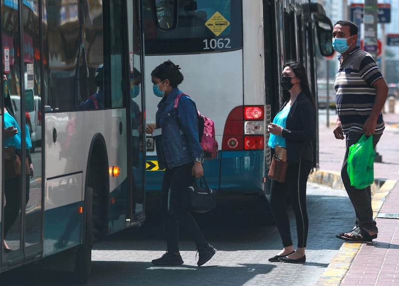 Abu Dhabi, United Arab Emirates, March 2, 2021.   Stock images covid. Commuters get on a bus at Hamdan St. central Abu Dhabi.
Victor Besa / The National
Section:  NA/Stock Images