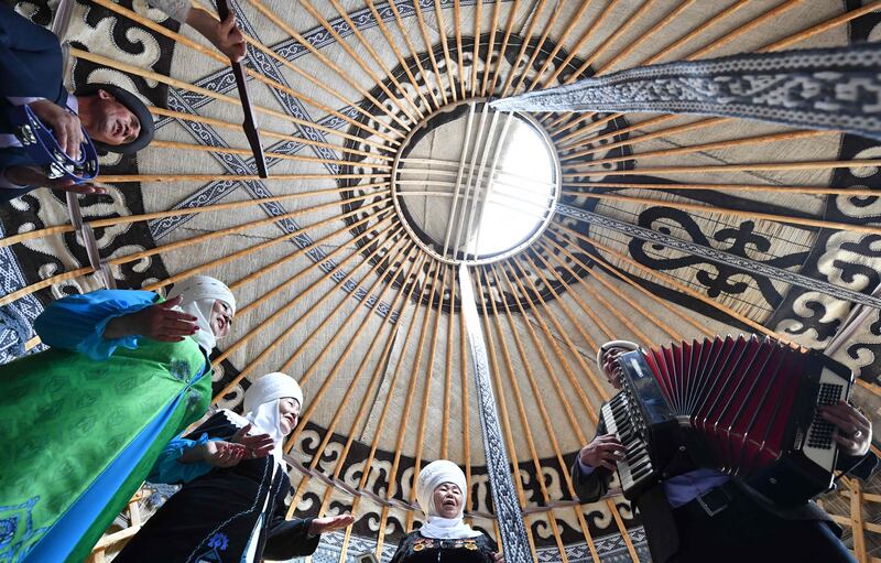 Performers in traditional costumes take part in Nowruz celebrations in Bishkek, Kyrgyzstan. AFP