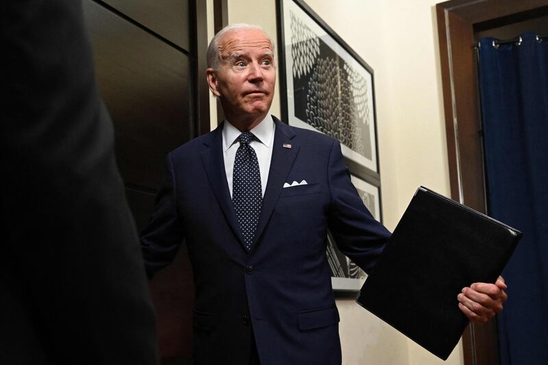 US President Joe Biden exits the room after speaking to the travelling press following a working session with Saudi Arabia’s Crown Prince at the Al-Salam Palace in Jeddah, on July 15. AFP