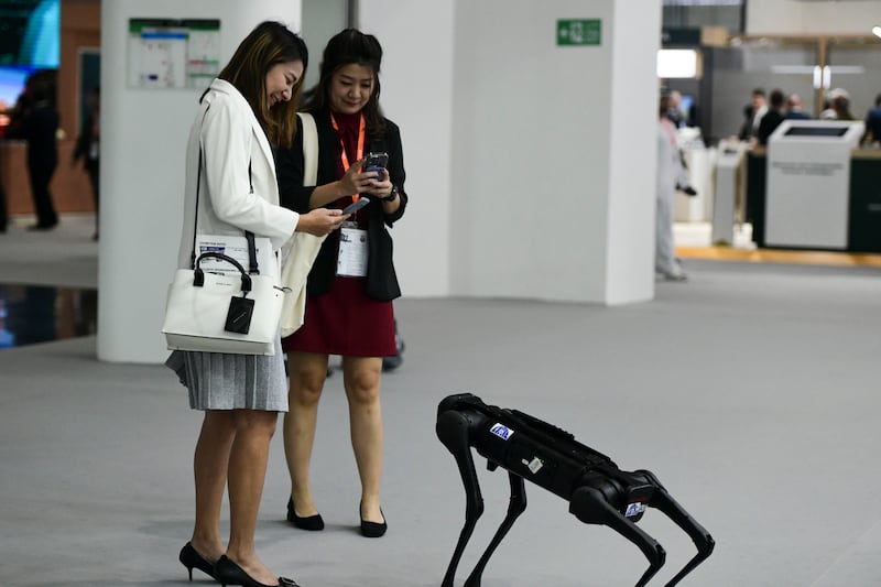 Robots entertaining visitors at Idex and Navdex 2023 at Abu Dhabi National Exhibition Centre. Khushnum Bhandari / The National 

