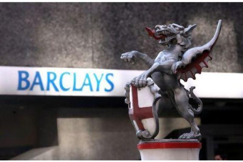 A statue of a Griffin carrying the coat of arms of the City of London stands on a pedestal outside a branch of Barclays bank in London, U.K., on Friday, April 23, 2010. The City marks its boundaries with a single "griffin" at each road leading into the City of London. Photographer: Chris Ratcliffe/Bloomberg *** Local Caption *** 665087.jpg