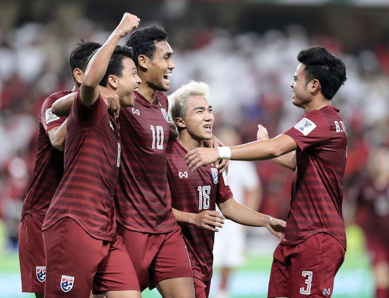 Al Ain, United Arab Emirates - January 14, 2019: Thitiphan Puangjan of Thailand battle during the game between UAE and Thailand in the Asian Cup 2019. Monday, January 14th, 2019 at Hazza Bin Zayed Stadium, Al Ain. Chris Whiteoak/The National