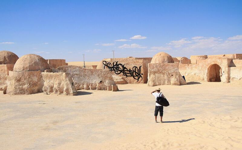 eL Seed visited the Star War's film set and after taking permission from a sleepy security guard, took a black spray can and wrote on one of the walls in beautiful Arabic calligraphy “I will never be your son,” leaving the cultural reference as self-explanatory. Courtesy El Seed