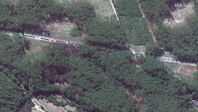 This satellite image provided by Maxar Technologies shows a military convoy southeast of Invankiv, Ukraine on Monday. Photo: Maxar Technologies via AP