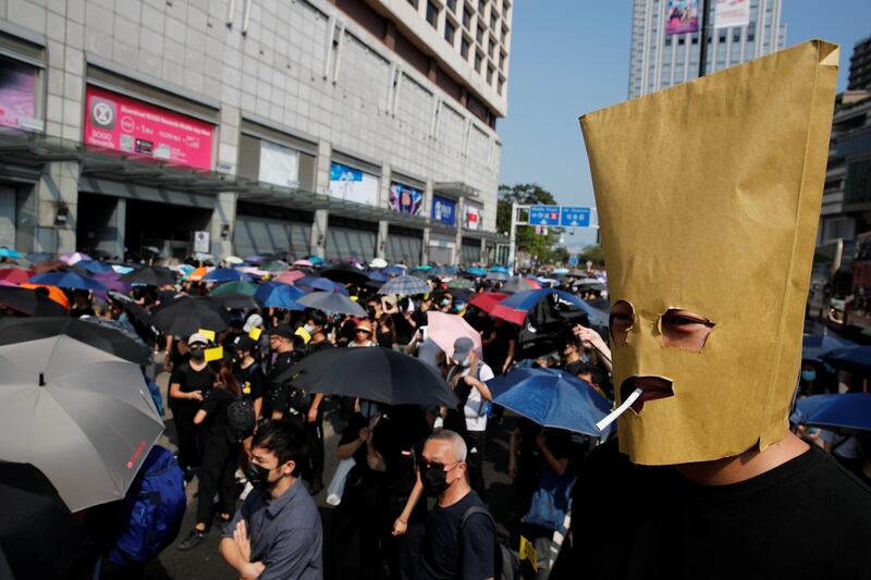 Anti-government demonstrators attend a protest march in Hong Kong, China. Reuters