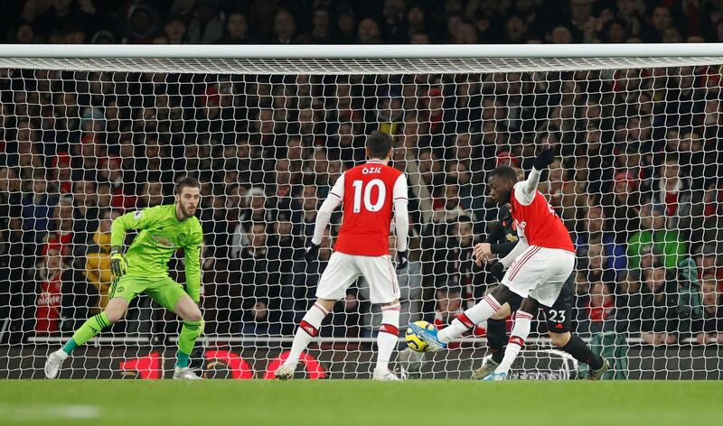 Arsenal's Nicolas Pepe scores the first goal against Manchester United. Reuters