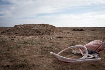 The grave of a man who died while being evacuated from Baghouz, Syria, 8 March 2019.