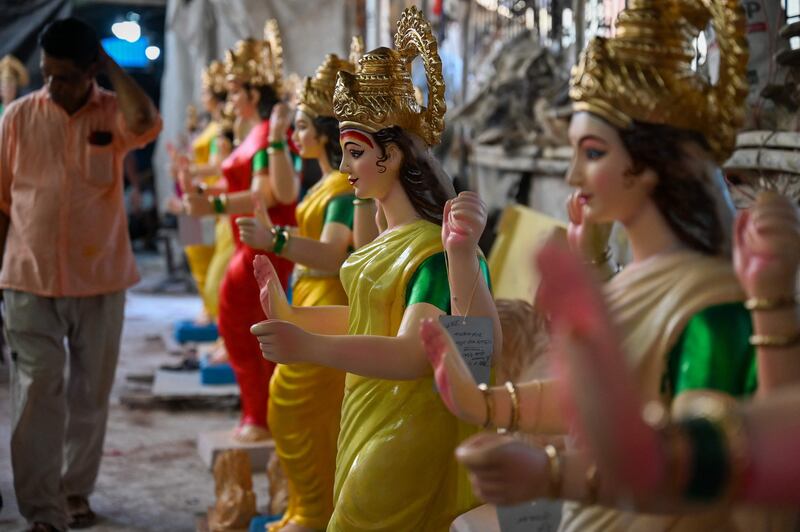 Creative shops are lined up with sculptures of the goddess Durga before Hindu devotees make a beeline for them for the celebratory festival beginning October 7. AFP