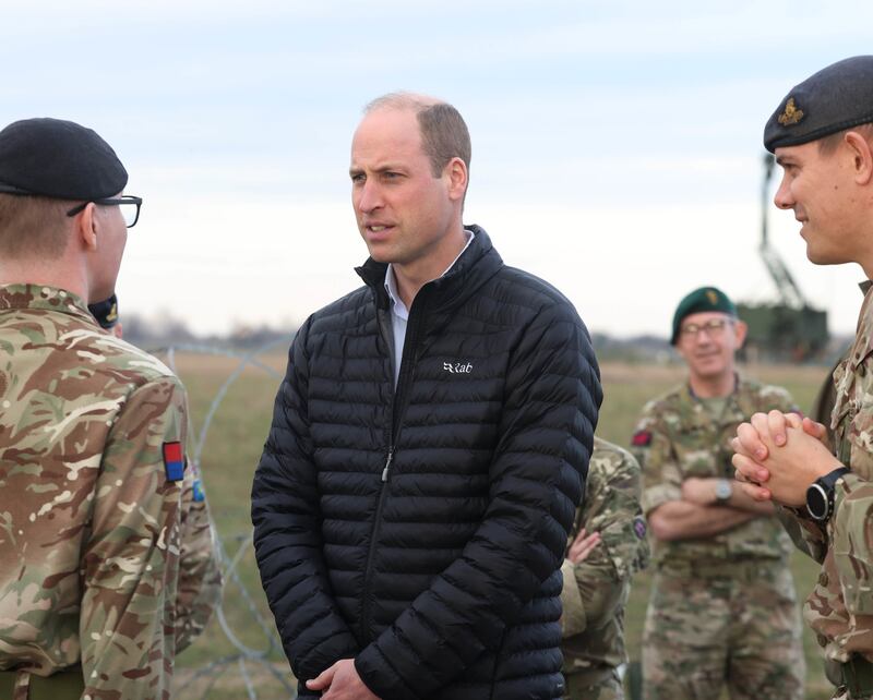 Prince William meets members of the British military. Getty