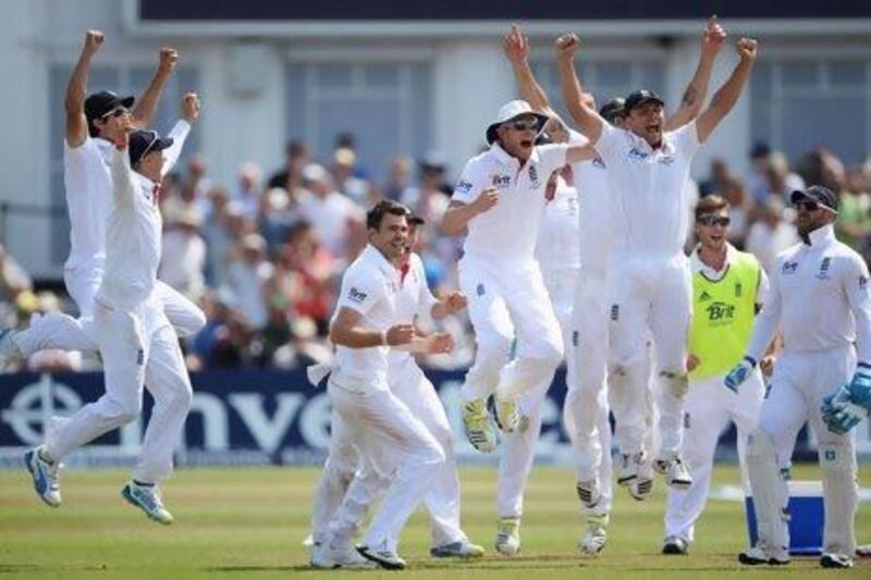 England celebrate after the TV umpire confirms the final wicket of Brad Haddin. Gareth Copley / Getty Images