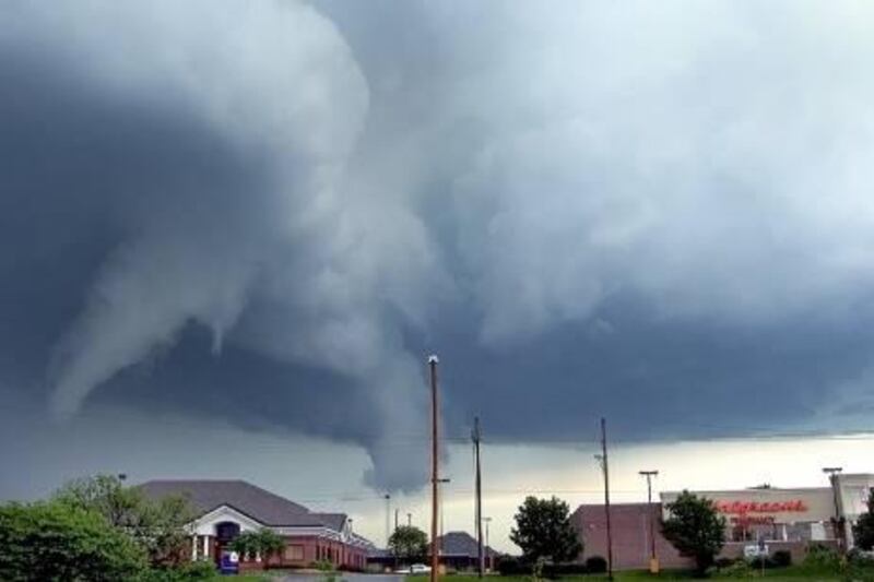 This photo taken Saturday, May 21, 2011 from a view looking east from S.W. 37th and Wanamaker shows funnel clouds above Topeka, Kan. at around 6:20 p.m. The National Weather Service issued a series of tornado warnings as the storm system moved throughout the region late Saturday afternoon and headed toward Missouri Saturday evening. No major damage or injuries were reported. (AP Photo/The Capital-Journal, Phil Anderson)