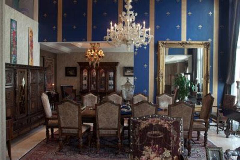 An antique Murano glass chandelir hangs above the formal dining room.