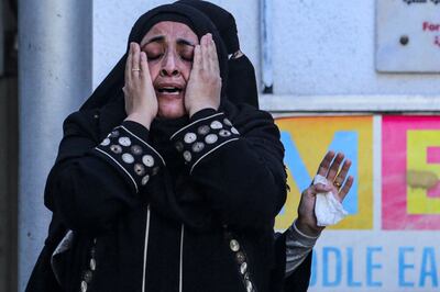 A Palestinian woman after an Israeli strike on a building in Nuseirat in Gaza. AFP