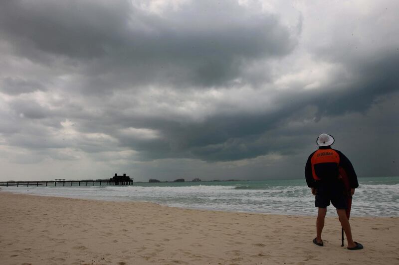 DUBAI. 16th Dec.2008. A lifeguard on duty at a deserted Madinat Jumeirah beach in Dubai yesterday(weds) as cloud and rain kept the holiday makers indoors. Stephen Lock  /  The National.   *** Local Caption ***  SL-cloud-003.jpgSL-cloud-003.jpg