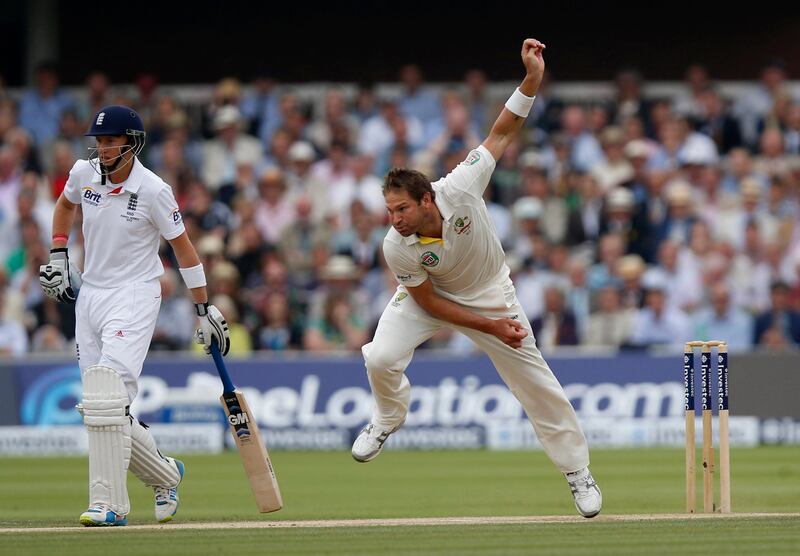 Australia's Ryan Harris, right, bowls to England's Jonny Bairstow during day 4 of the second Ashes Test at Lord's cricket ground in London, Sunday, July 21, 2013. (AP Photo/Sang Tan) *** Local Caption ***  Britain Cricket England Australia.JPEG-00314.jpg