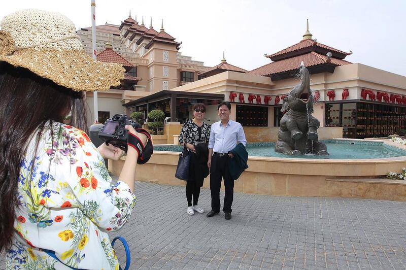 Chinese outbound tourism growth rate is forecast at 10.4 per cent annually from 2013 to 2020. Above, Chinese tourists visit Anantara Hotel at The Palm in Dubai. Jeffrey E Biteng / The National