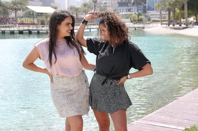 DUBAI,  UNITED ARAB EMIRATES , OCTOBER 14  – 2019 :- Maram Hussein ( left ) and Lana Makhzoumi ( right ) , co-hosts of one of the most popular podcasts in the Middle East  DXBabies at the Media City Park in Dubai. ( Pawan Singh / The National ) For Arts. Story by Ann Marie McQueen