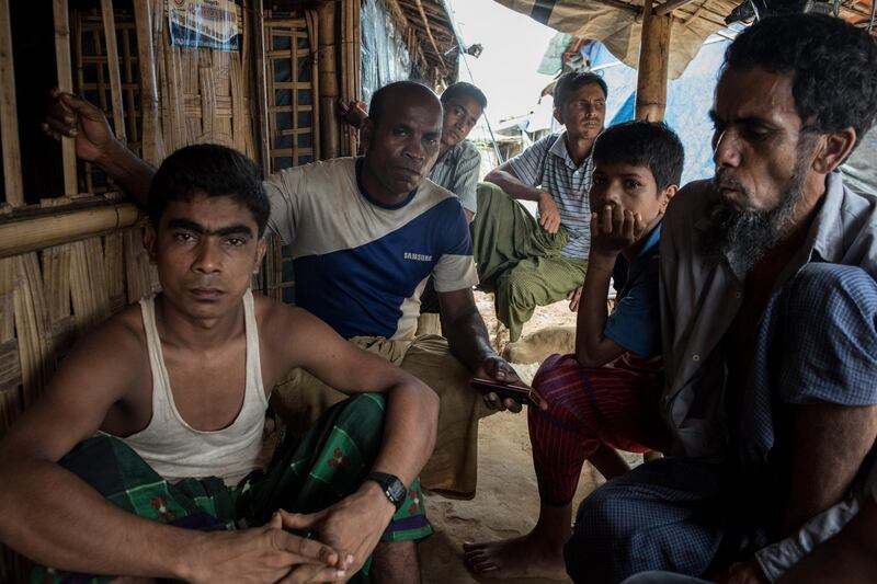These Rohingya men all fled their village when Myanmar soldiers attacked last August. Camp 13, Cox's Bazar, Bangladesh, August 11 2018. Campbell MacDiarmid for The National