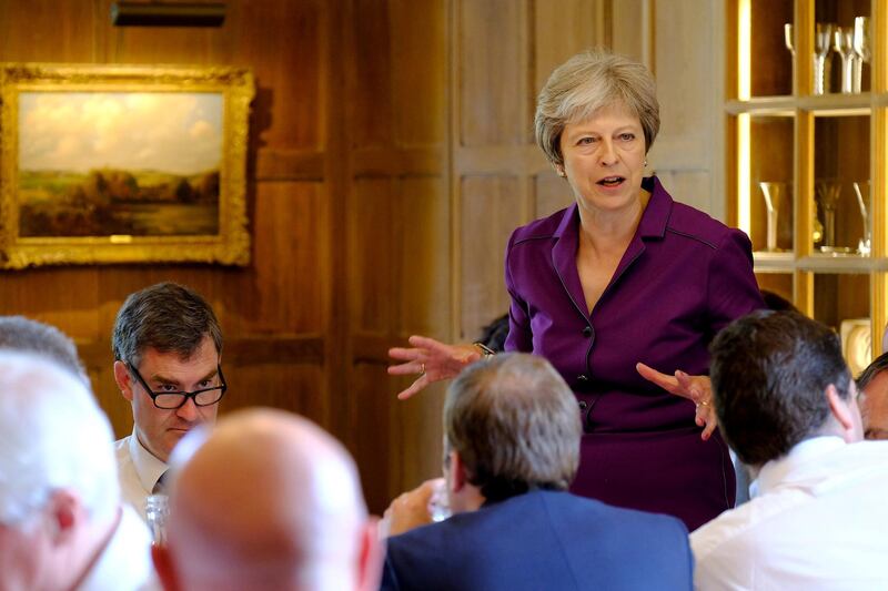 Britain's Prime Minister Theresa May commences a meeting with her cabinet to discuss the government's Brexit plans at Chequers, the Prime Minister's official country residence, near Aylesbury, Britain, July 6, 2018. Joel Rouse/MOD/Handout via REUTERS  -  ATTENTION EDITORS  -  THIS IMAGE WAS SUPPLIED BY A THIRD PARTY. NO RESALES. NO ARCHIVES.