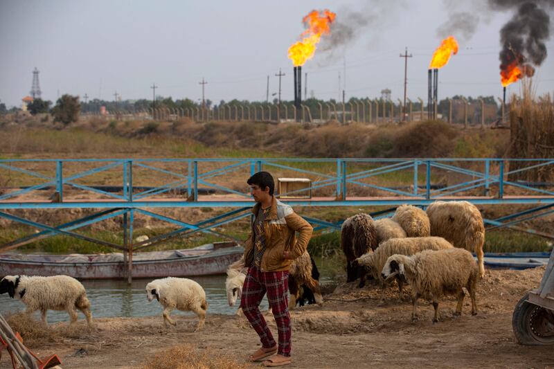 The Nahr Bin Omar oilfield near Basra. Iraq is Opec’s largest producer after Saudi Arabia and oil revenue accounts for 95 per cent of its income. AFP