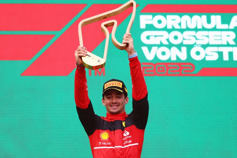 Ferrari's Charles Leclerc celebrates after winning the Austrian Grand Prix at the Red Bull Ring on Sunday, July 10, 2022