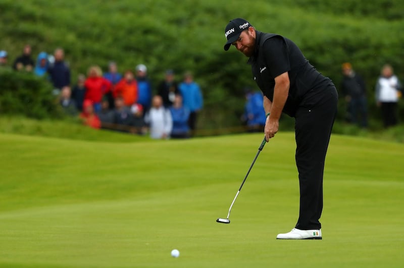 Lowry putts during the final round. Getty Images