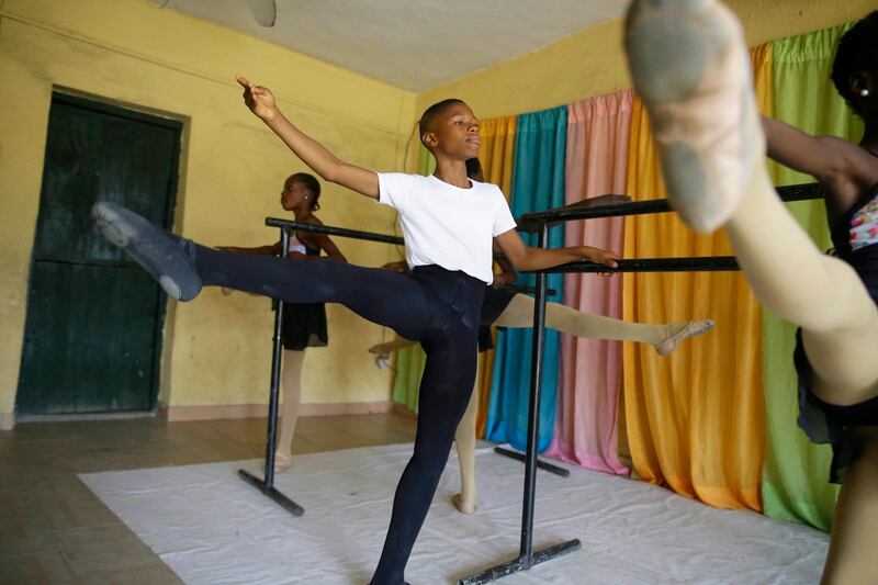 Cellphone video showing the 11-year-old dancing barefoot in the rain went viral on social media. AP photo