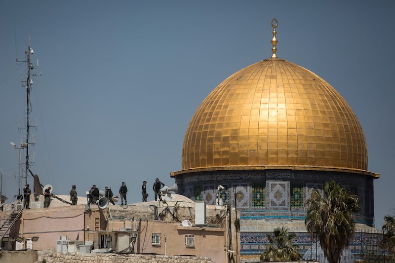 Israeli police officers keep watch after clashes with Muslim worshippers in Jerusalem. The overlapping religious occasions – Ramadan for Muslims, Passover for Jews and Easter for Christians – have increased tensions near contested sacred sites in Jerusalem. Getty Images