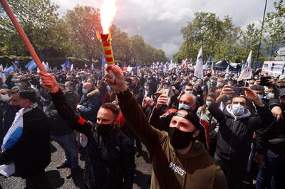 French police officers from all over France gather in front of the National Assembly in Paris to protest against violence against themselves and require a greater severity in the penal response to their aggressors, France, May 19, 2021. REUTERS/Christian Hartmann