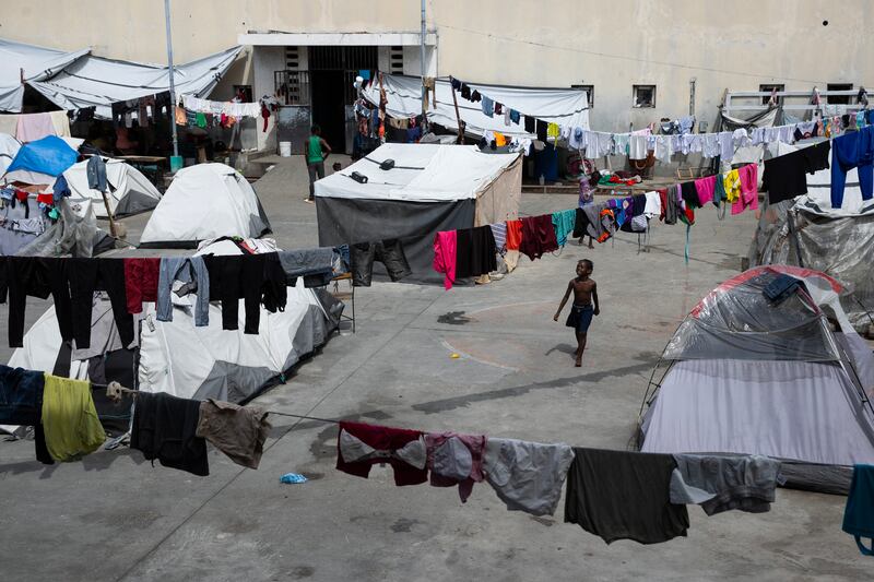 A camp for displaced people at the Gymnasium Vincent sports centre in Port-au-Prince, Haiti. More than 1,120 people, half of them minors, live in poverty at the centre, which is behind the former official residence of the country's president. EPA