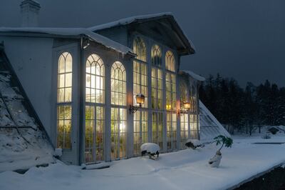 A still showing a greenhouse in the snow, from Kristina Norman's video trilogy 'Orchidelirium' (2022) for the Estonian National Pavilion. Photo: Erik Norkroos